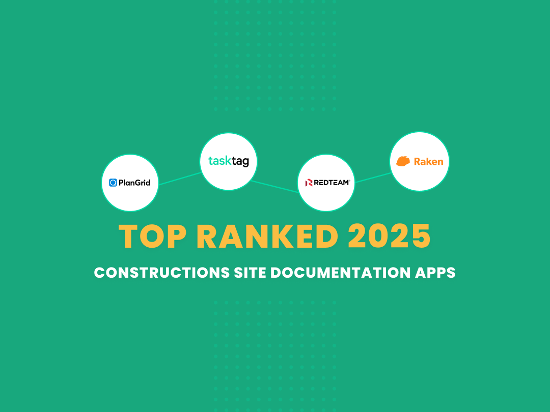 A general contractor using a mobile tablet on an active 2026 construction site to document project progress.